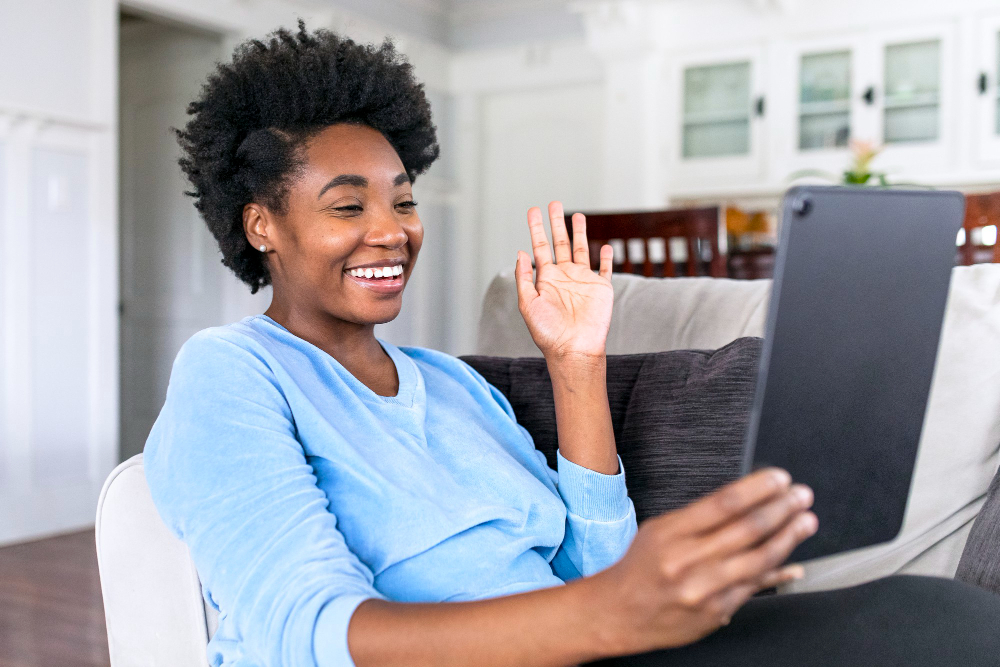Patient receiving secure online psychiatric counseling treatment from home